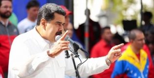 Maduro afirma que garantizará distribución de productos básicos
